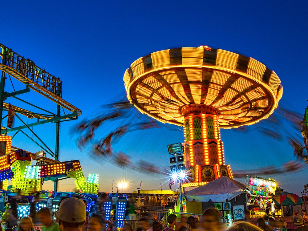 This is a panorama of the Paso Robles Mid-State Fair taken at dusk