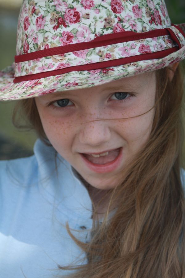 Girl in floral hat thumbnail