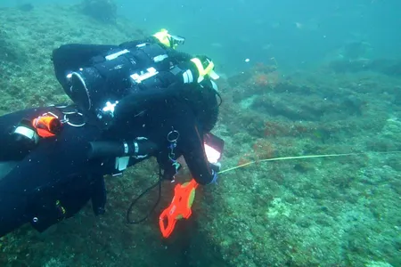 Researchers diving amongst the wreckage of the S.S. Cotopaxi, which disappeared almost 95 years ago.