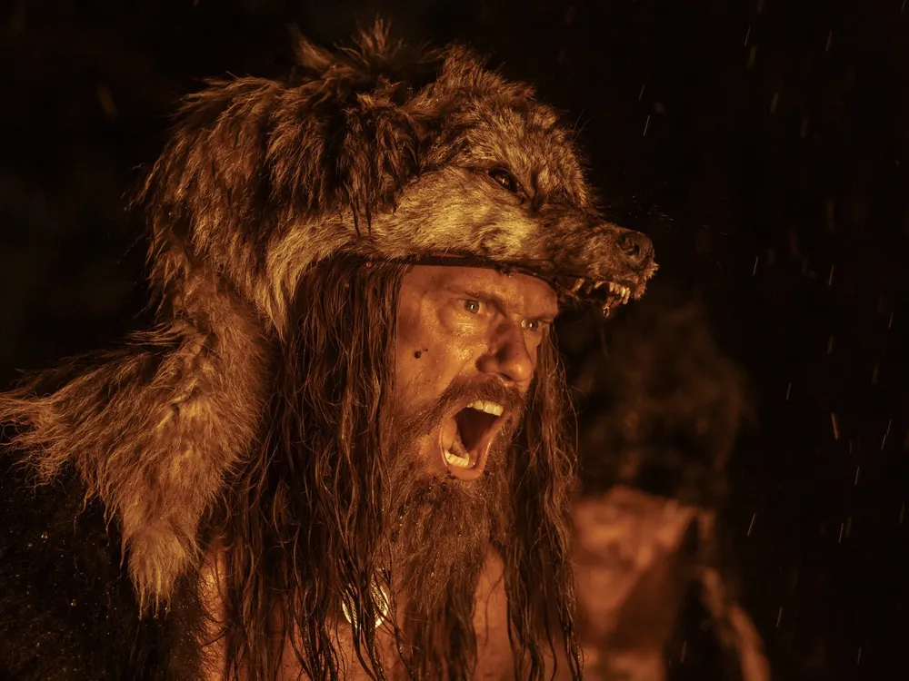 Alexander Skarsgård as Amleth, wearing an animal skin hood