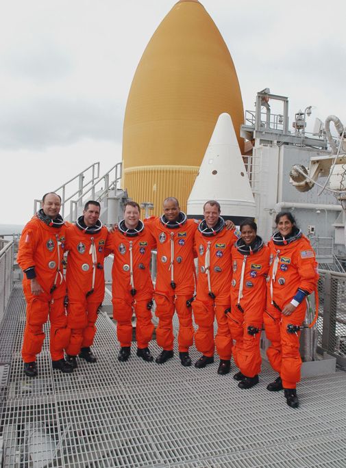 The crew of STS-116 prepares for their December 7 space shuttle launch.