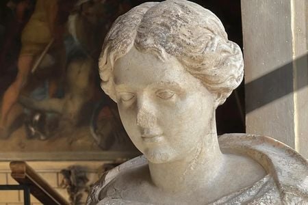 The statue was discovered in two pieces, one much older than the other, near Burghley House in Lincolnshire.