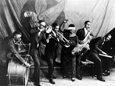 Ma Rainey poses with her band for a studio group shot c. 1924-25.