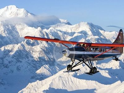 With Mount Hunter looming over his right wing, Paul Roderick, director of flight operations for Talkeetna Air Taxi, flies over his favorite place to ski.
