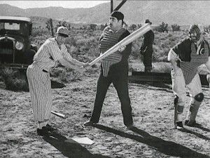 Buster Keaton tangles with umpire Dewey Robinson in One Run Elmer (1935)