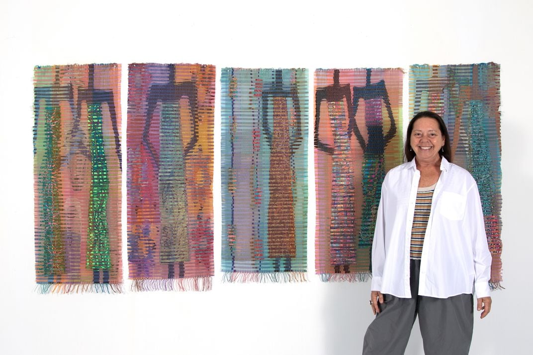 Hollie Heller with her fiber artworks