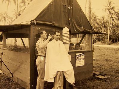 If you need a haircut on this South Pacific island, look for the Warhawk Barber Shop with its barber pole made of a bomb shell. 