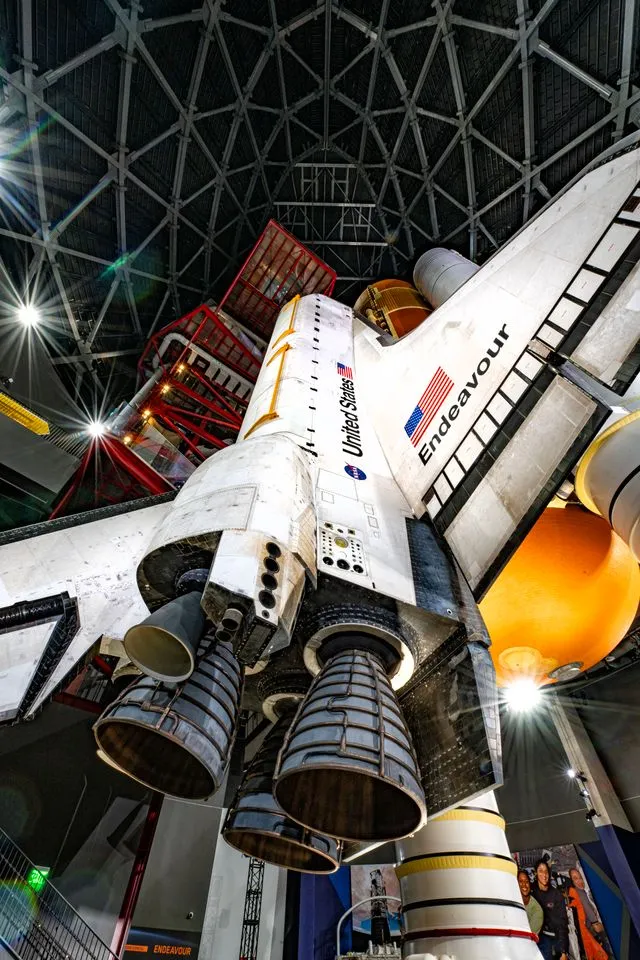 Ground-level view of vertical Endeavor shuttle at the California Science Center