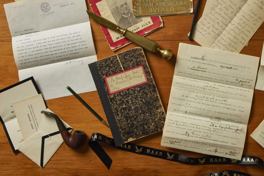 Papers, notebook and other artifacts on a table