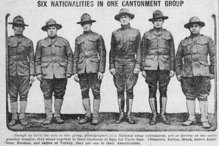 A newspaper's photograph of six men, all of different ethnicities. The caption reads: "Through by birth the men in this group, photographed at a National army cantonment, are as diverse as one could possibly imagine, they stand together in their readiness to fight for Uncle Sam."