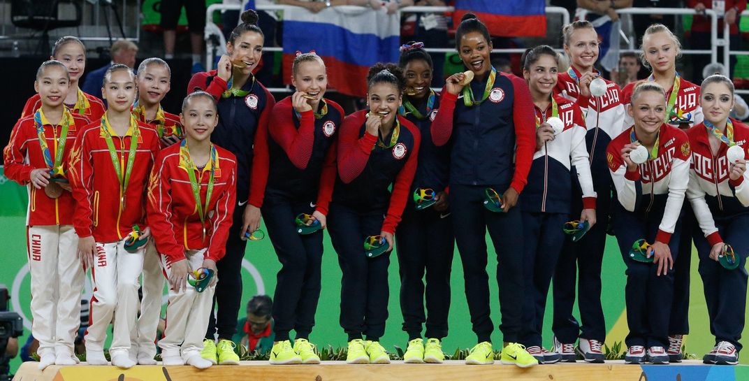 The U.S. women's team (center) won gold at the 2016 Rio Olympics.