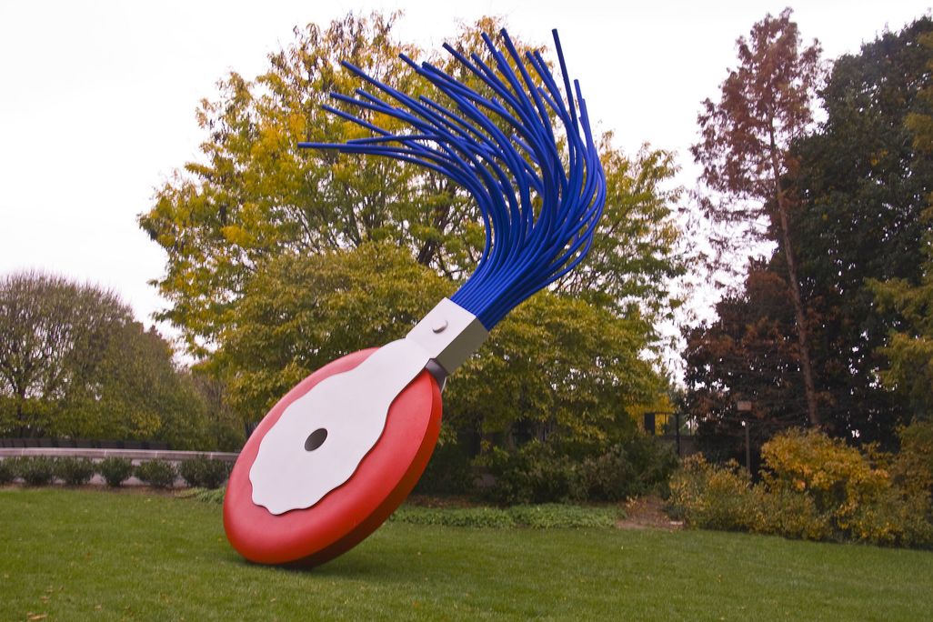 Red and blue sculpture of typewriter eraser