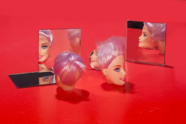 Heads With Purple Hair Gaze Into Mirrors on a Red Surface thumbnail