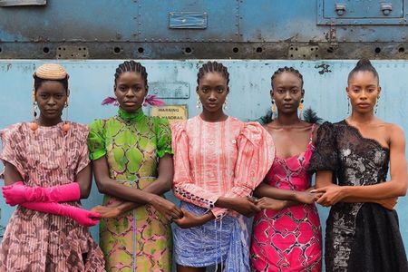 Models holding hands in Lagos, Nigeria, in 2019