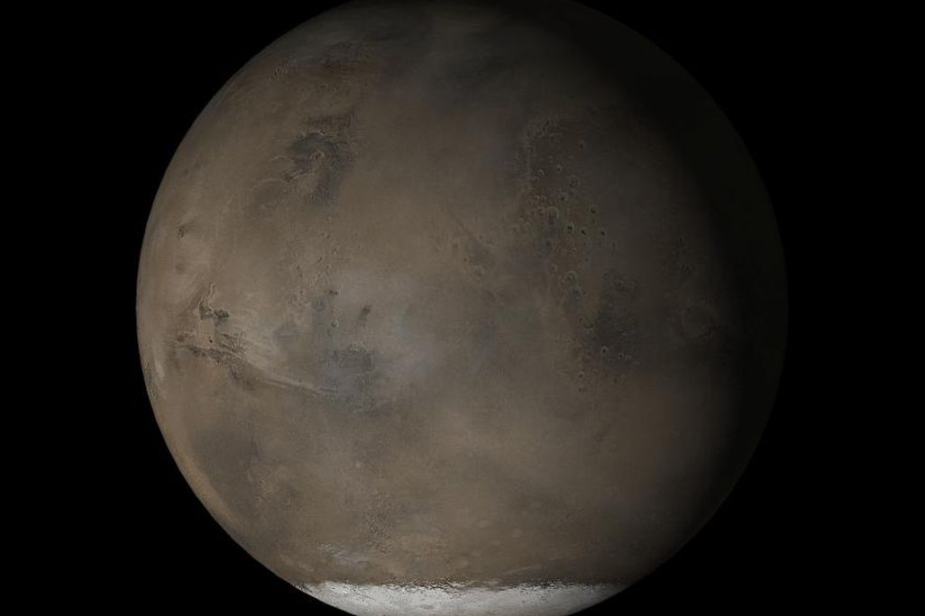 A composite image shows Mars from the side, emphasizing the southern polar ice cap