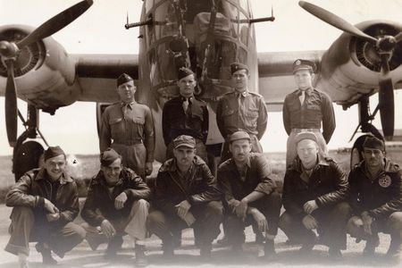 Pilot Hugh Maxwell (with his crew, standing, far left). 
