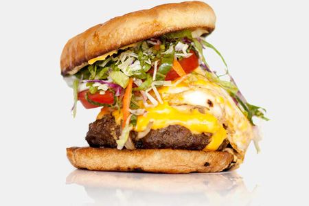 The Breakfast Burger at Roosevelt’s Tamale Parlor in San Francisco might be an acquired taste for some people. (photo courtesy MINE™)