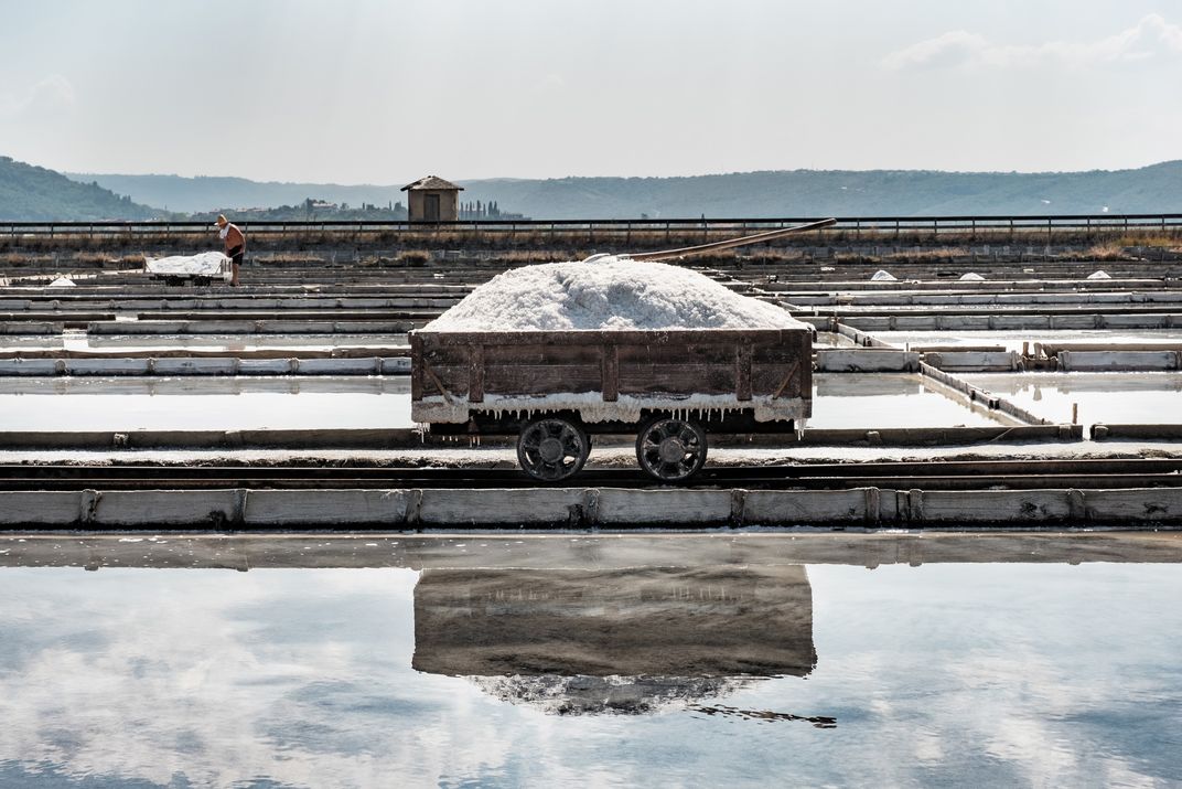 Workers harvest salt in Piran, across from Venice on the Adriatic Coast. Janez Bratovž of JB Restavracija uses this salt at his Ljubljana establishment.