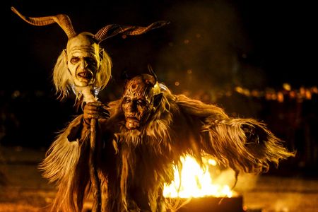 A man dressed in a traditional Perchten costume and mask performs during a Perchten festival in the western Austrian village of Kappl, November 13, 2015. Each year in November and January, people in the western Austria regions dress up in Perchten (also known in some regions as Krampus or Tuifl) costumes and parade through the streets to perform a 1,500 year-old pagan ritual to disperse the ghosts of winter.