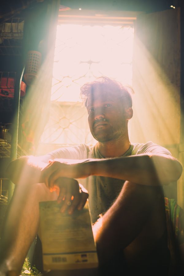 Photographers's portrait with a book thumbnail