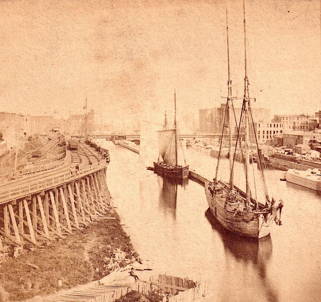 Old photo of a ship with masts