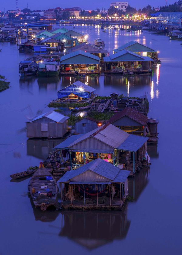 Floating house village in night thumbnail