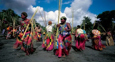 Villagers on the island of Tanna dance in John Frum's honor each February 15. Clan leaders first saw their Yankee Messiah in the late 1930s. He later appeared to them during WWII, dressed in white like the unidentified navy seaman.