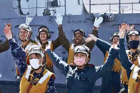 The mood was celebratory aboard the Japanese ship Izumo last October when U.S. Marines landed and took off again. After the cross-deck exercise, Japanese sailors and airmen cheered along with U.S. Marines of Fighter Squadron 242.