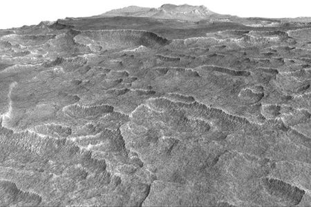 This vertically exaggerated view shows scalloped depressions in a part of Mars where such textures prompted researchers to check for buried ice, using ground-penetrating radar aboard NASA's Mars Reconnaissance Orbiter. They found about as much frozen water as the volume of Lake Superior.