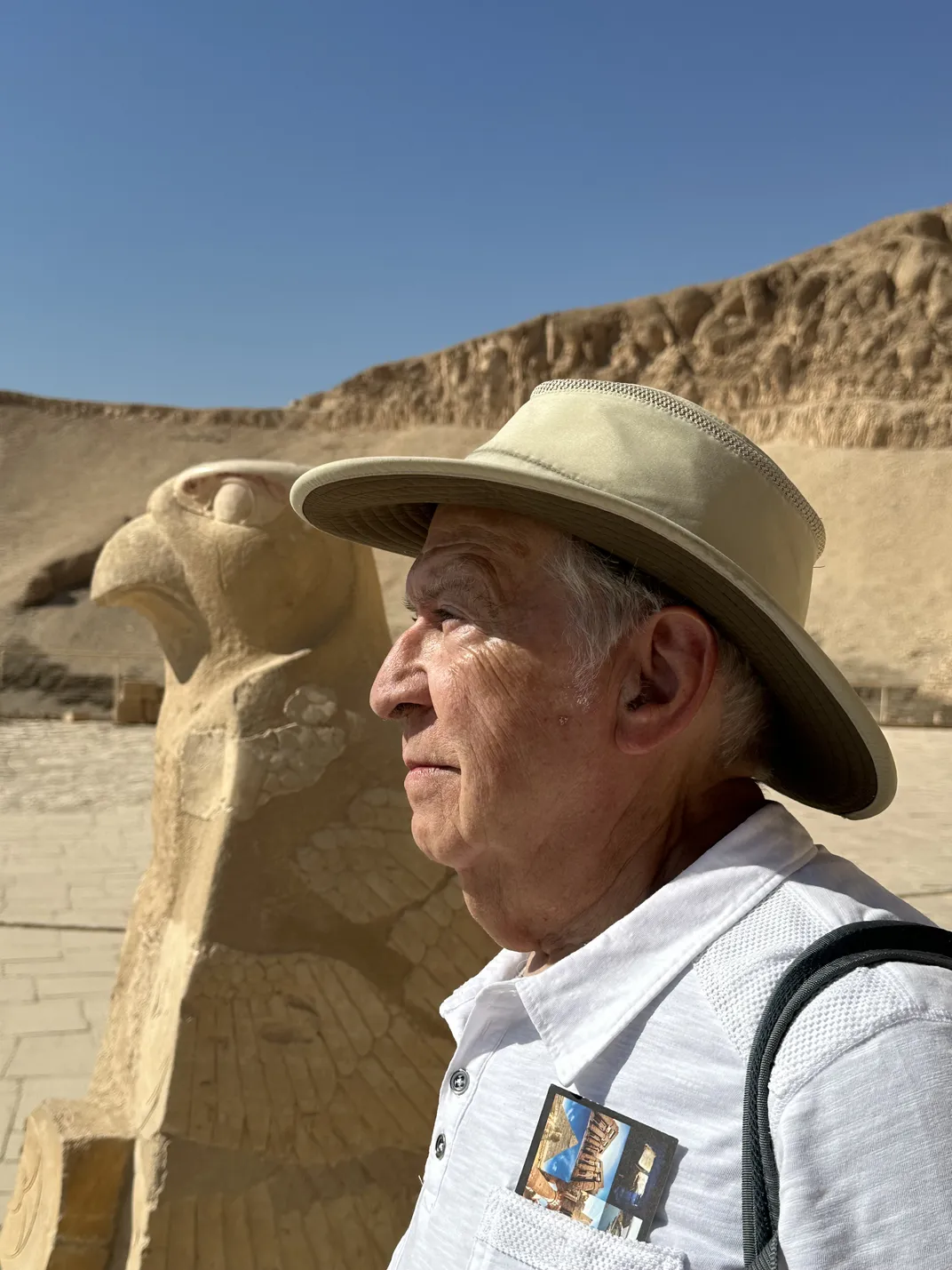 9 - A man compares his profile to that of Horus, an ancient Egyptian god who’s depicted in a statue near the Temple of Hatshepsut.