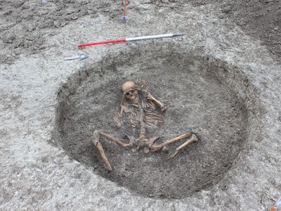 A Neolithic woman was buried with her arms bound behind her head and her amputated feet placed on either side of her body