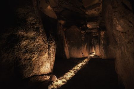 One of the interior passages of the 5,000-year-old Irish megalithic tomb of Newgrange. In this photo, sunlight enters the monument's main chamber at dawn on the winter solstice.

