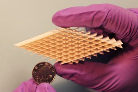 Laser-cut paper coated in conductive materials allows this small device to generate electricity just by being squeezed.