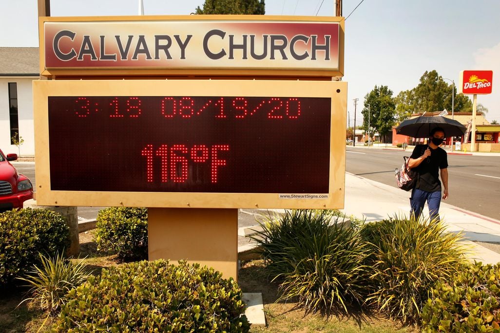 A digital Calvary Church sign in Woodland Hills displays the temperature at 3:18 p.m. on 8/18/2020 as 116 degrees Fahrenheit