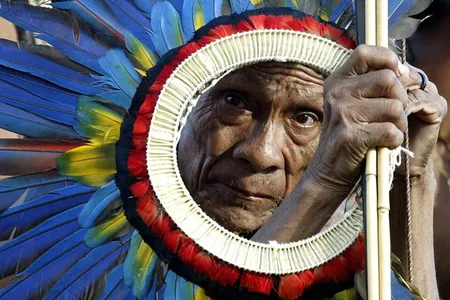 Brazil's Surui people, like the man pictured above, share ancestry with indigenous Australians, new evidence suggests. 