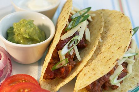 Mexican silver miners likely invented the taco, Mexican Americans in the Southwest reinvented it, and Glen Bell mass-marketed it via the crunchy Taco Bell shell.