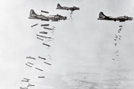 Flying Fortresses of the 303rd bomber group (Hell’s Angels) drop a heavy load on industrial targets in Germany.