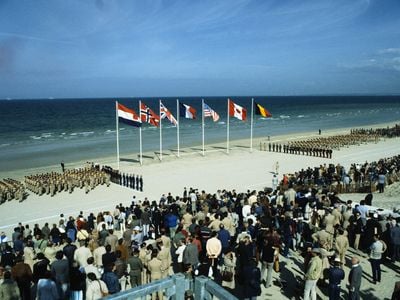 Hundreds of spectators and D-Day veterans gather at Omaha Beach, the bloodiest site during the battle, for the 40th anniversary in 1984.