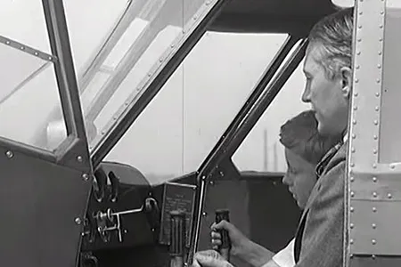 Gore Vidal and his father show how easy it is to work the controls of the Hammond Model Y.