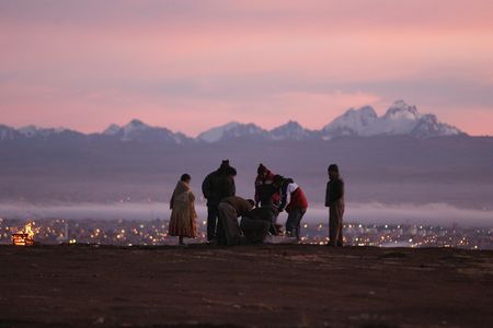 Aymara people prepare an offering to Mother Earth during the sunrise of the winter solstice ceremony in La Apacheta, El Alto, on the outskirts of La Paz.