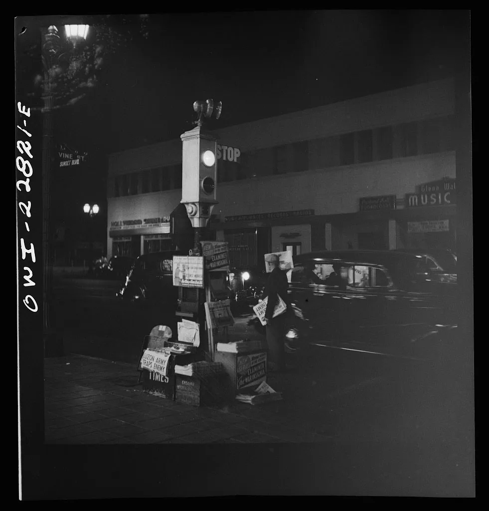 A newsboy’s stand and traffic light in Los Angeles, 1942